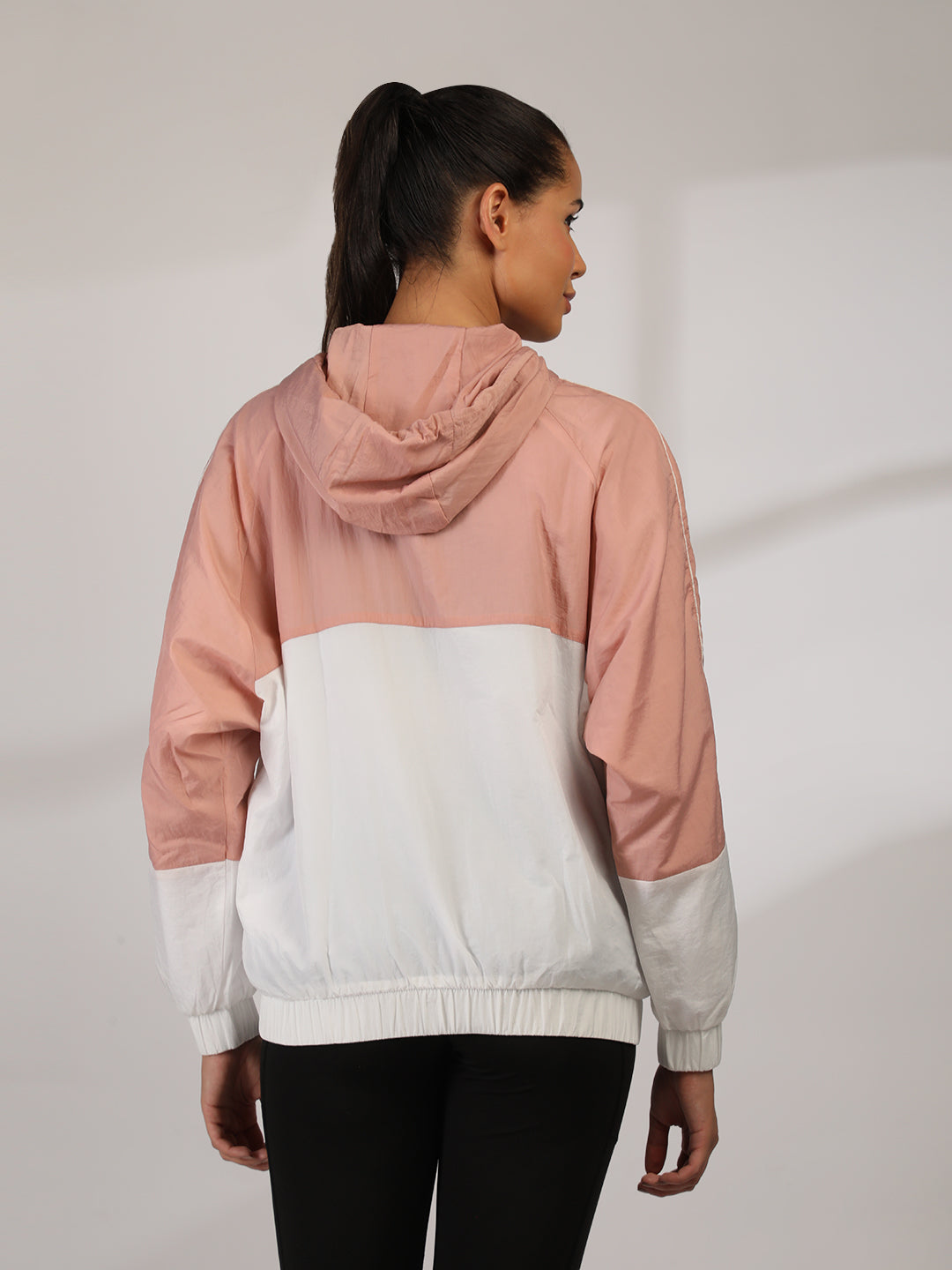 Women Colourblocked Hooded Windcheater Oversized Sports Jacket Peach White