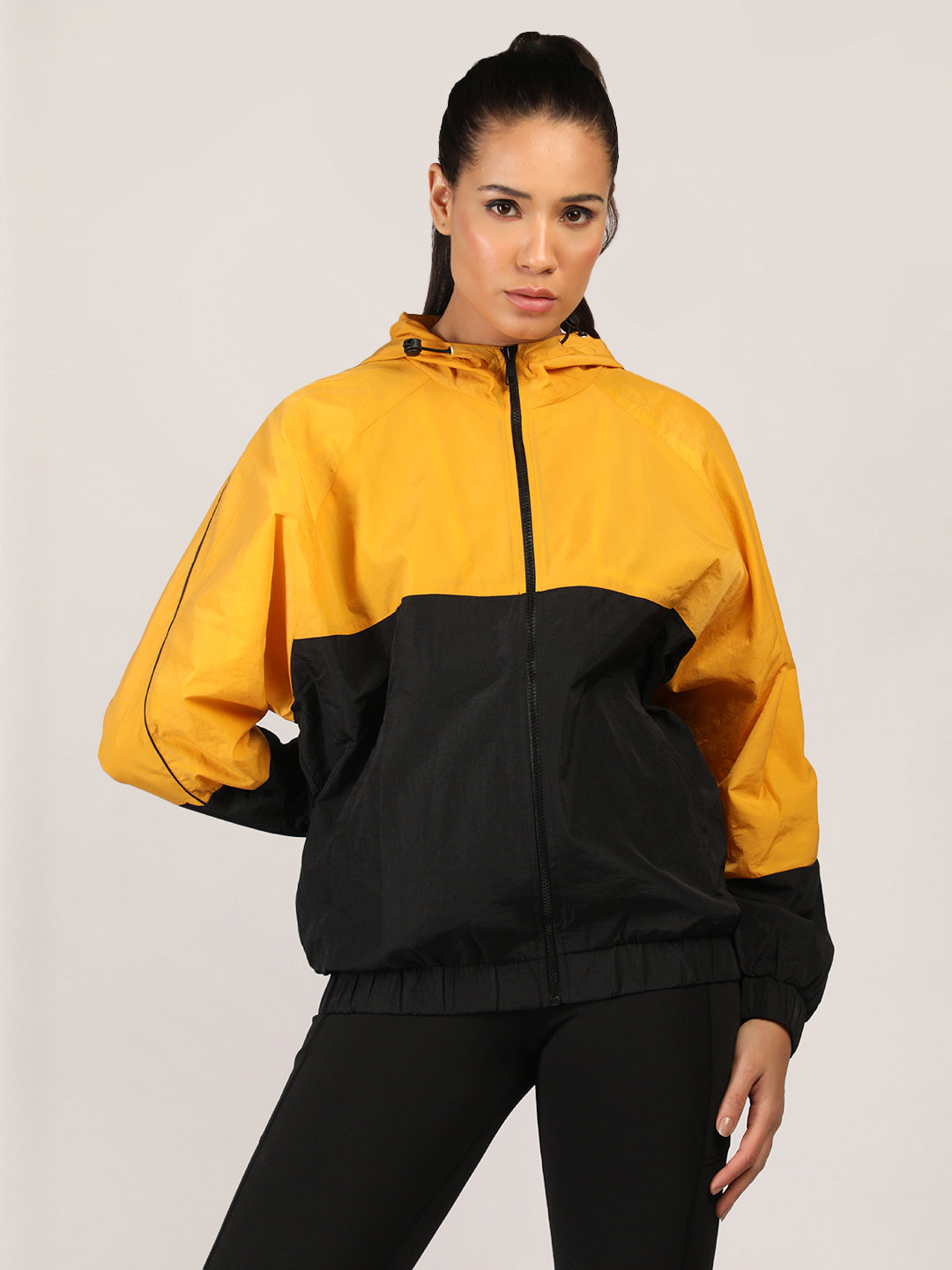 Women Colourblocked Hooded Windcheater Oversized Sports Jacket Yellow Black