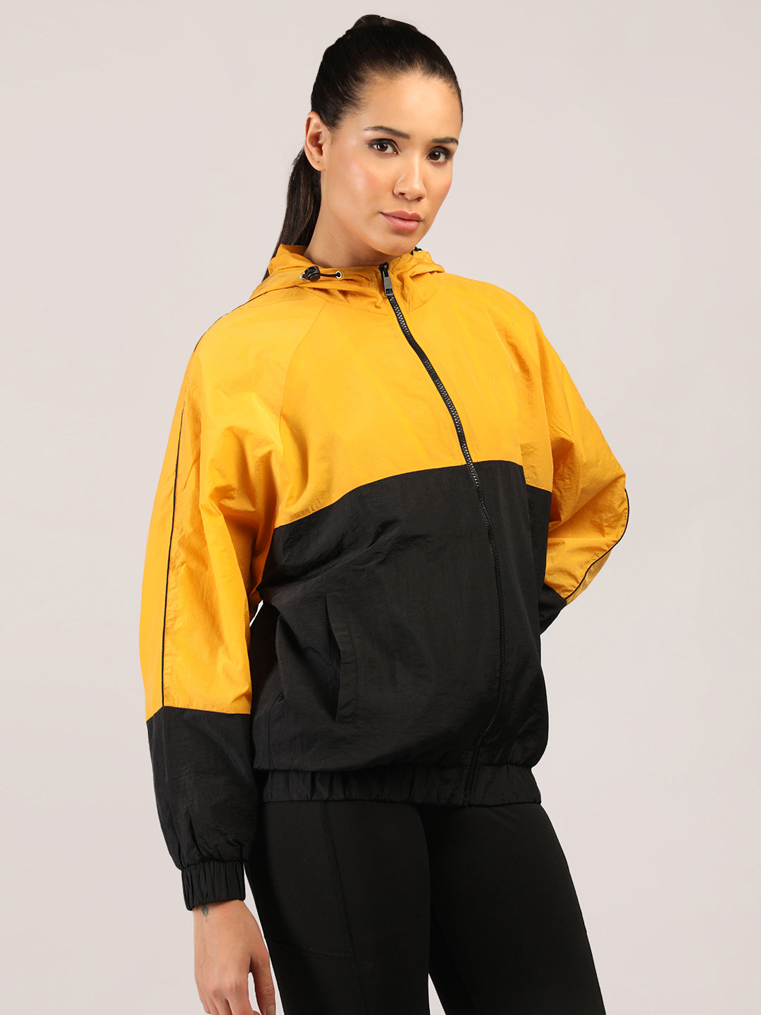 Women Colourblocked Hooded Windcheater Oversized Sports Jacket Yellow Black