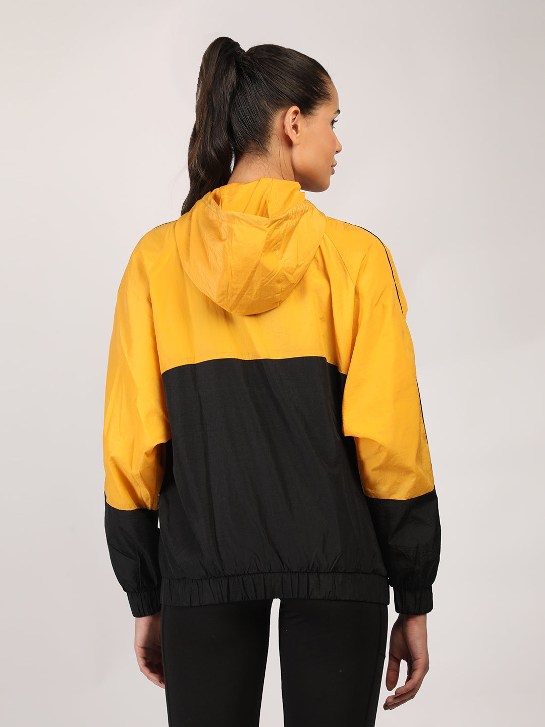 Women Colourblocked Hooded Windcheater Oversized Sports Jacket Yellow Black